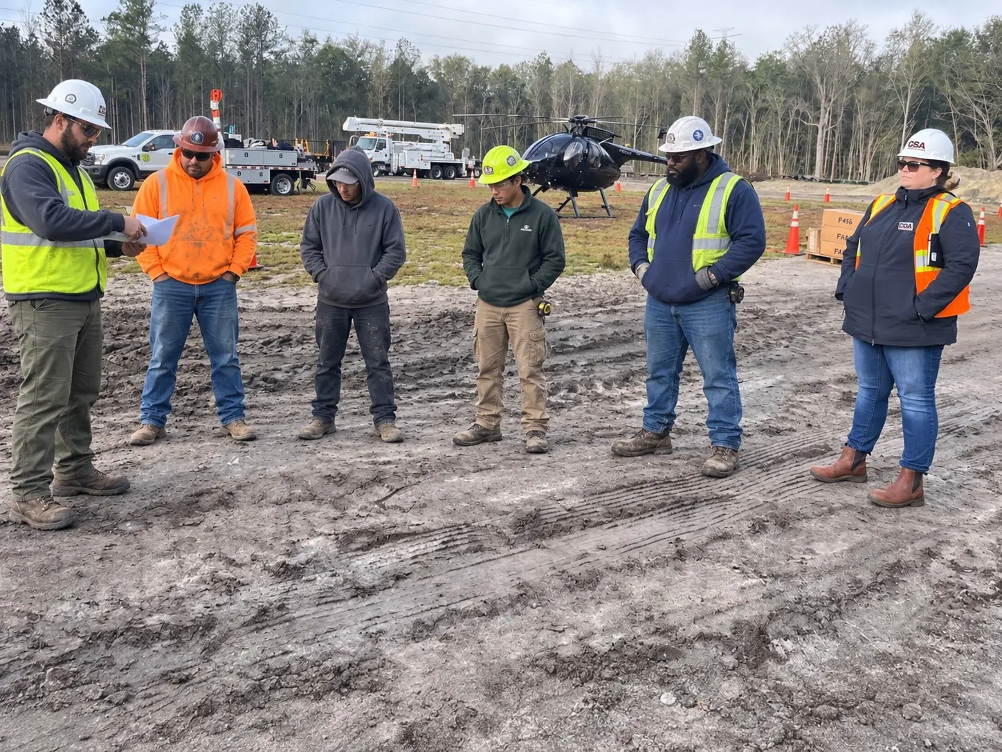 GSA representative meeting with a construction field team